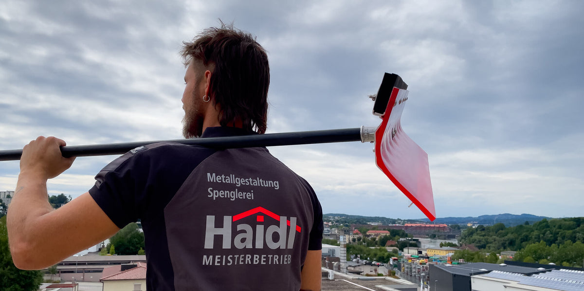 Flachdachreinigung / Wasserentfernung am Flachdach (Flachdach-Schieber + Flachdach-Schlucker). - Haidl Products